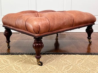 A Hand Crafted Tufted Chestnut Leather Ottoman/Coffee Table By Vanguard Furniture