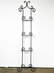 A Wrought Iron Plate Rack