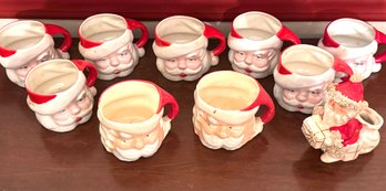 Nine Ceramic Santa Mugs And A Napco Santa Spoon Holder