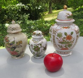 A Trio Of Ceramic Covered Ginger Jars