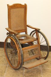 Antique Early And VERY COOL OAK WOOD Medical Sanitarium  Wheel Chair With Cane Seat