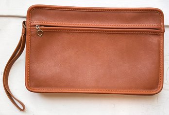 A Makeup Bag Or Clutch By Coach