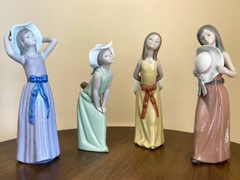 A Collection Of Lladro Figurines: 5009 Curious Girl, 5011 Trying On, 5006 Naughty Girl, 5007 Bashful...