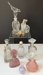 Nine Vintage Perfume Bottles With Special Glass Roller Skate