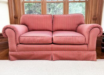 A Classic Rolled Arm Loveseat In Satin Stripes - And Look At Those Legs Under That Skirt!