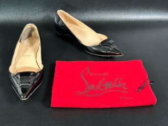 A Pair Of Black Patent Flats Made In Italy By Christian Louboutin, Women's 7.5