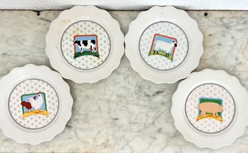 A Set Of 4 Vandor Collection Plates