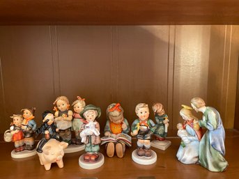 Collection Of Hummel Figurines.