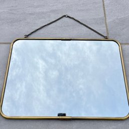 A  Brass Framed Hanging Mirror