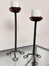 A Pair Of Twisted Iron Candleholders