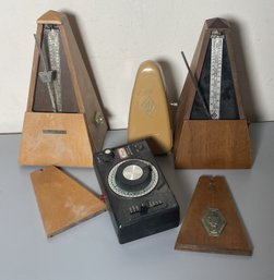 FOUR METRONOMES