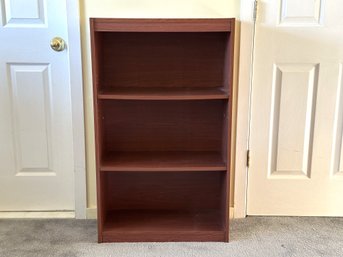 A Simple Bookcase In Woodgrain Laminate