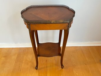 Antique Mahogany Table With Brass Accents