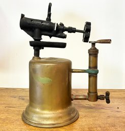 An Antique Brass Blow Torch
