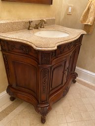 A Classic Empire Two Door Two Drawer Vanity With Kohler Sing And Bronze Tone Fosset