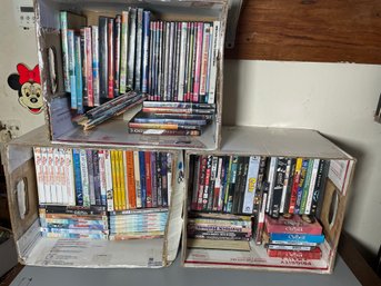 TWO BOXES OF DVDS