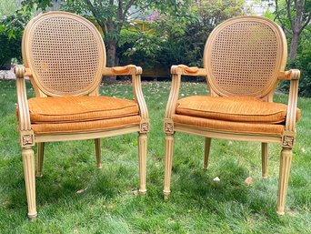 A Pair Of Vintage Louis XVI Style Cane Back Fauteuils