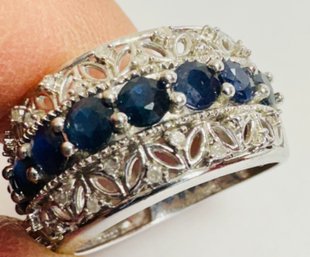 PRETTY STERLING SILVER BLUE SPINEL AND DIAMOND ACCENT RING