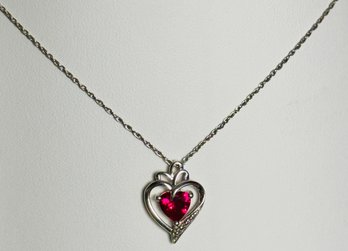 PRETTY STERLING SILVER AND RUBY HEART NECKLACE