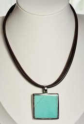 SQUARE STERLING SILVER AND TURQUOISE PENDANT ON SILVER TONE & MULTI COLOR PLASTIC NECK CHAIN