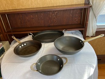 Four Pieces Of Calphalon Cookware
