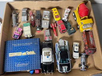 A FLAT OF TOY CARS