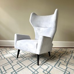 A Jonathan Adler Modern Blue Velvet Milano Wing Chair