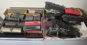 TWO FLATS OF ANTIQUE TOY TRAINS