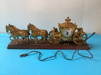 Heavy Metal Horse And Carriage Plug In Clock