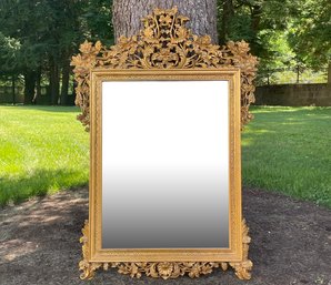 A Large, Ornate Gilt Framed Beveled Mirror By Aberdeen Designs