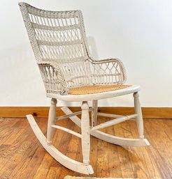 An Antique Wicker Rocking Chair - New Caning On Seat