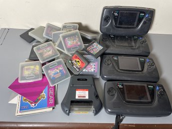 LOT OF SEGA GAME GEARS WITH A TONS OF GAMES AND SOME ACCESSORIES