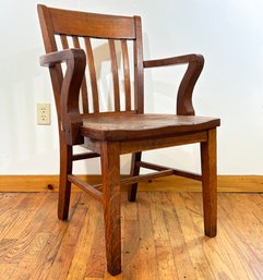 A 1920's Oak Desk Chair - AS IS
