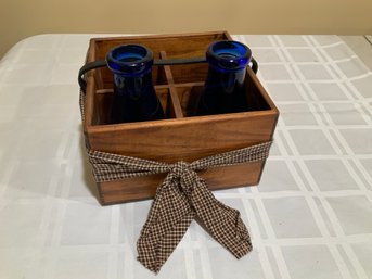 Cobalt Milk Bottles In Wooden Crate