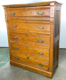 A 19th Century Paneled Oak Chest Of Drawers