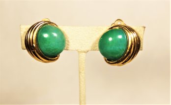 Signed Gold Tone Vintage Clip Earrings Having Green Stones