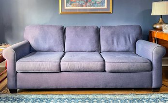 A Modern Sleeper Sofa By Pottery Barn With Gel Mattress In Navy Linen