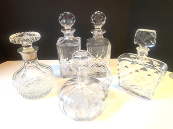 Five Vintage Crystal Decanters