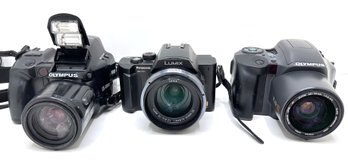 3 Digital SLR Cameras: 2 Olympus & Panasonic Lumix