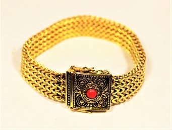 Gold Tone Mesh Bracelet Having Red Stone Magnetic Clasp