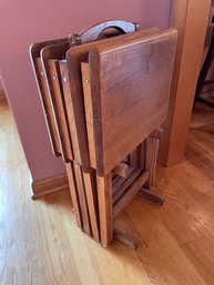 Set Of Four Solid Wood Folding Tables With A Rack.