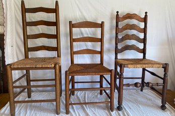Three Antique Ladder Back Chairs With Woven Seats