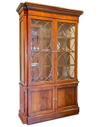 A Paneled Mahogany And Glass China Cabinet By Ethan Allen