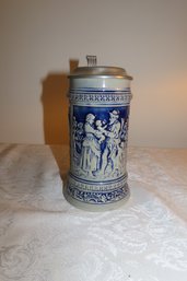 -German Made Stein Depicting Cherubs And Family Scene In Blue And Grey Colors