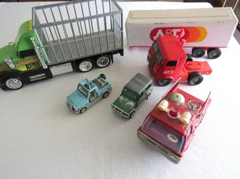 A Mixed Lot Of Trucks Including A&P Tractor Trailer
