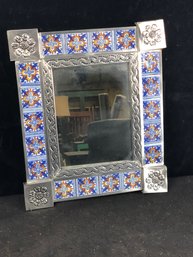 Blue And White Patterned Picture Frame With Orange And Yellow Coloring