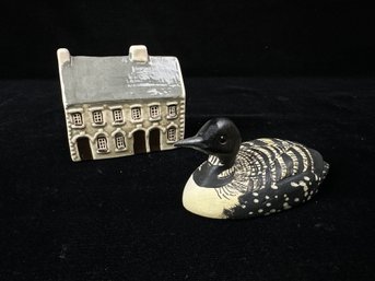 English House And Carved Duck