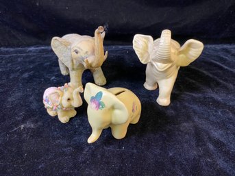 Several Piece Ceramic Elephant Figurines And Piggy Banks