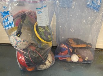 Two Bags Of Balls, Frisbees, And More