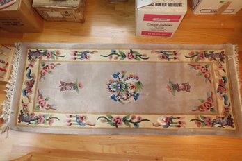 Rug With Grey Background With Dragon Motif In Middle, 30 Wide X 73 Long.  Fringe Measures 3 Long